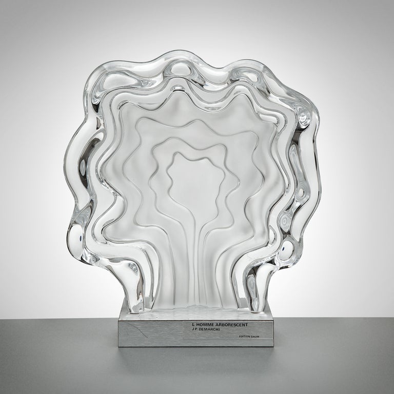 In form of multiple serpentine layers of frosted and polished glass, on silvered metal rectangular base with velvet underlining. Glass etched with 