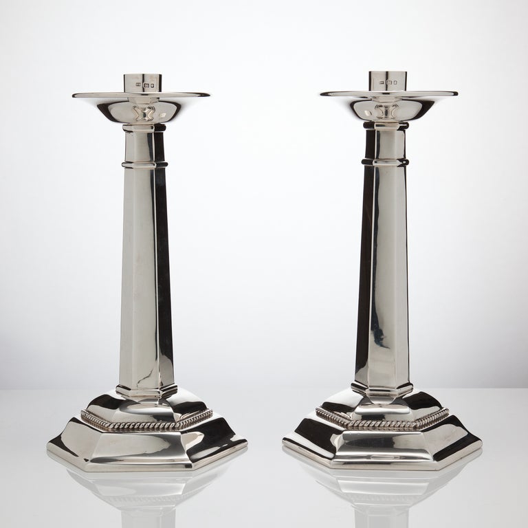 large silver candlesticks