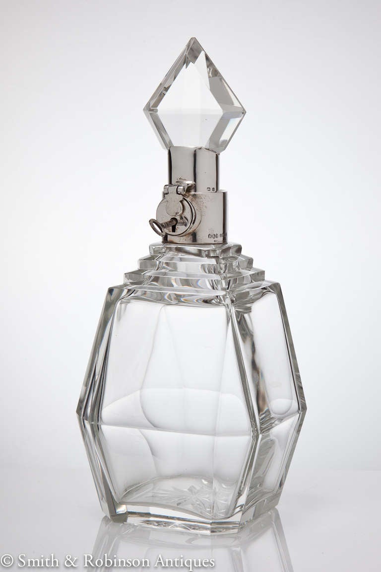 A rare and unusual English novelty locking decanter from the Art Deco period by Hukin & Heath with silver dated Birmingham, 1931. Superb quality with attractive overall form and Art Deco detailing.
We are always adding to our 1stdibs catalogue so
