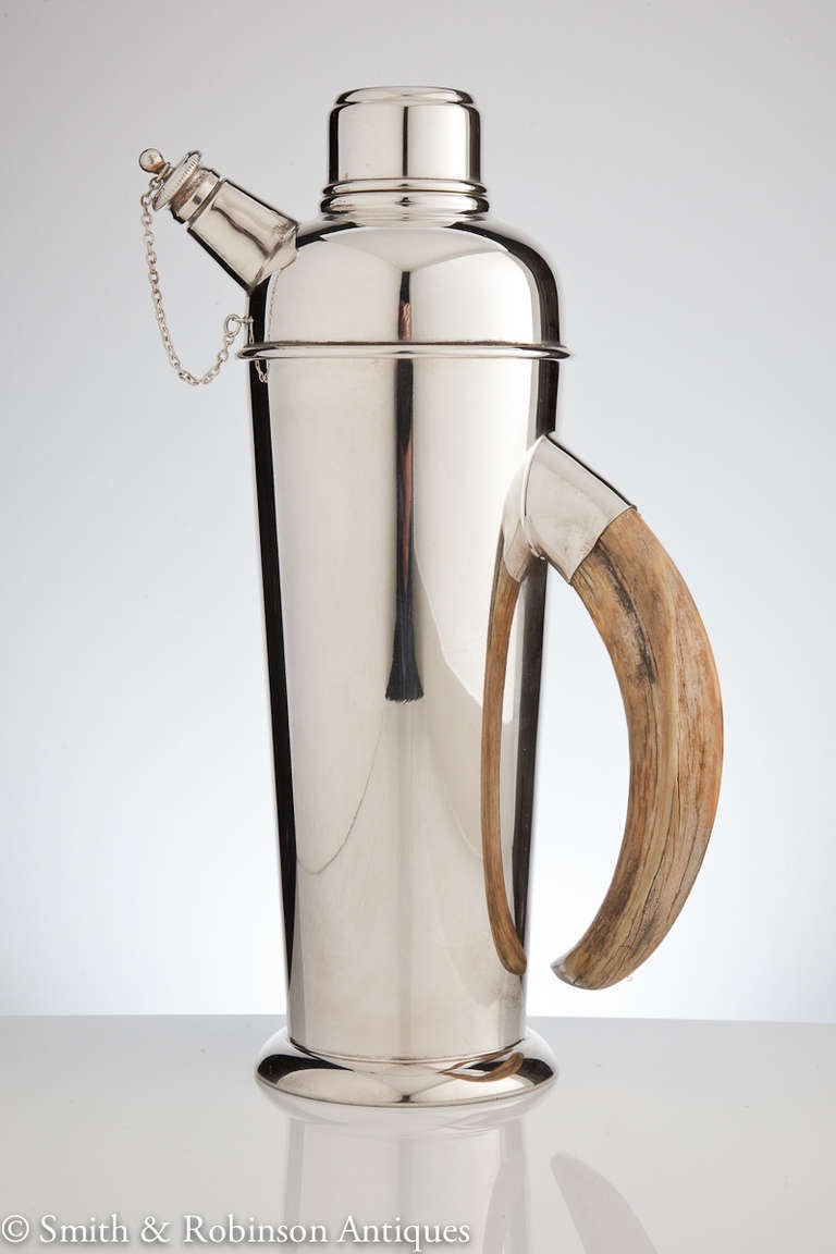 A great looking cocktail shaker with a European boars tusk handle & presented in great condition both exterior & interior.
English c.1925-30

We are always adding to our 1stdibs catalogue so be sure to add us to your favourite dealers & visit our