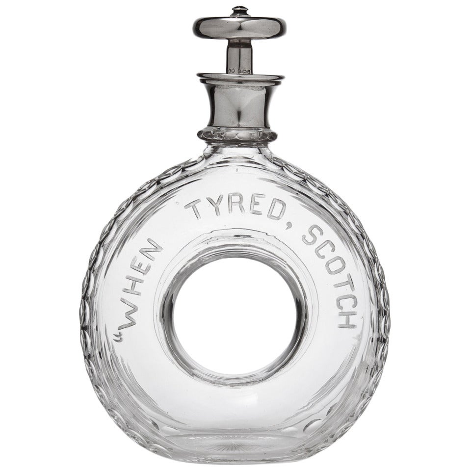 Novelty Silver and Glass Scotch Tyre Shaped Decanter, Birmingham 1907
