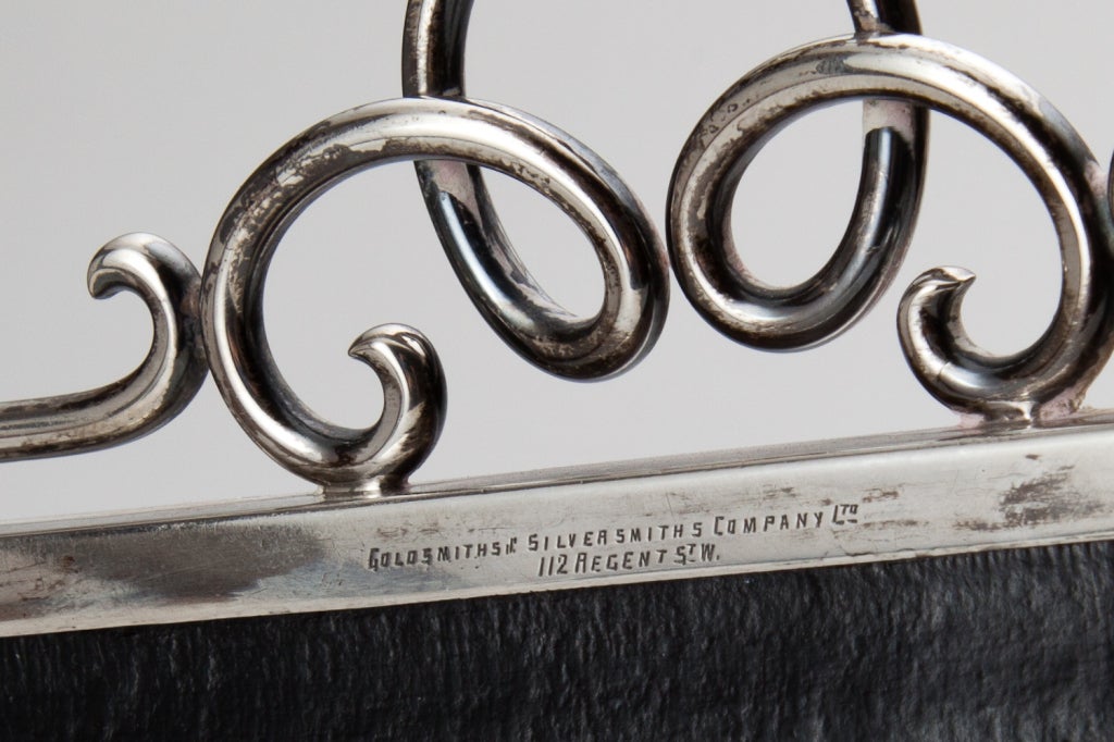 Silver & Blue Glass Frames by The Goldsmith & Silversmith Co.