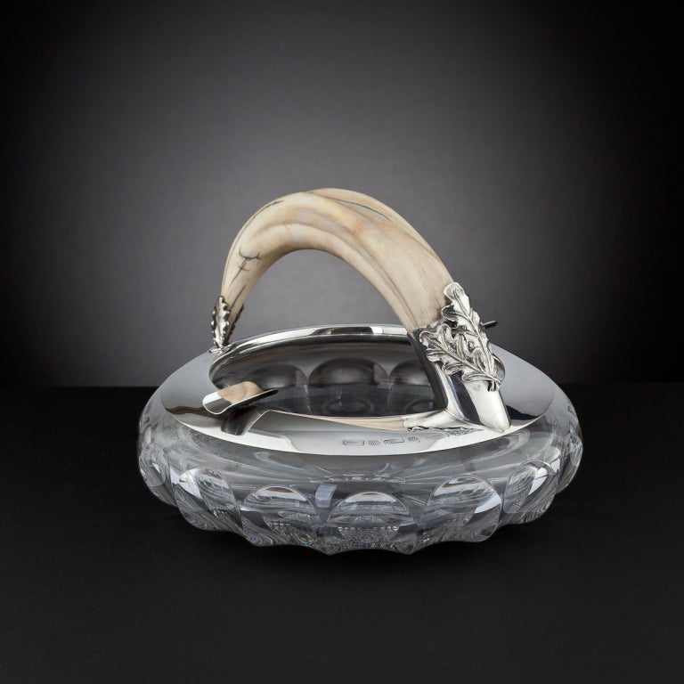 Large glass cigar ash tray with silver continental mounts with a boars tusk handle,
German hall marks circa 1910 -1915

Shown also with a silver mounted tusk cigar cutter in the form of a foxes head, available in a separate listing.