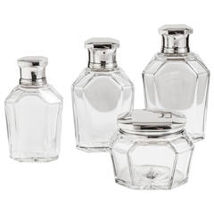 Set of Four Art Deco Elegant Silver-Top Perfume Bottles, French circa 1920 Set of Four Art Deco Elegant Silver-Top Perfume Bottles, French circa 1920