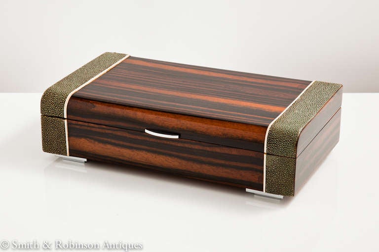 A superb quality & pure Art Deco coromandel & shagreen cigar box c.1925-30
Great styling with these materials, with a curving shape to the leading edge of the lid that is particularly pleasing.
The interior is cedar lined with optional
