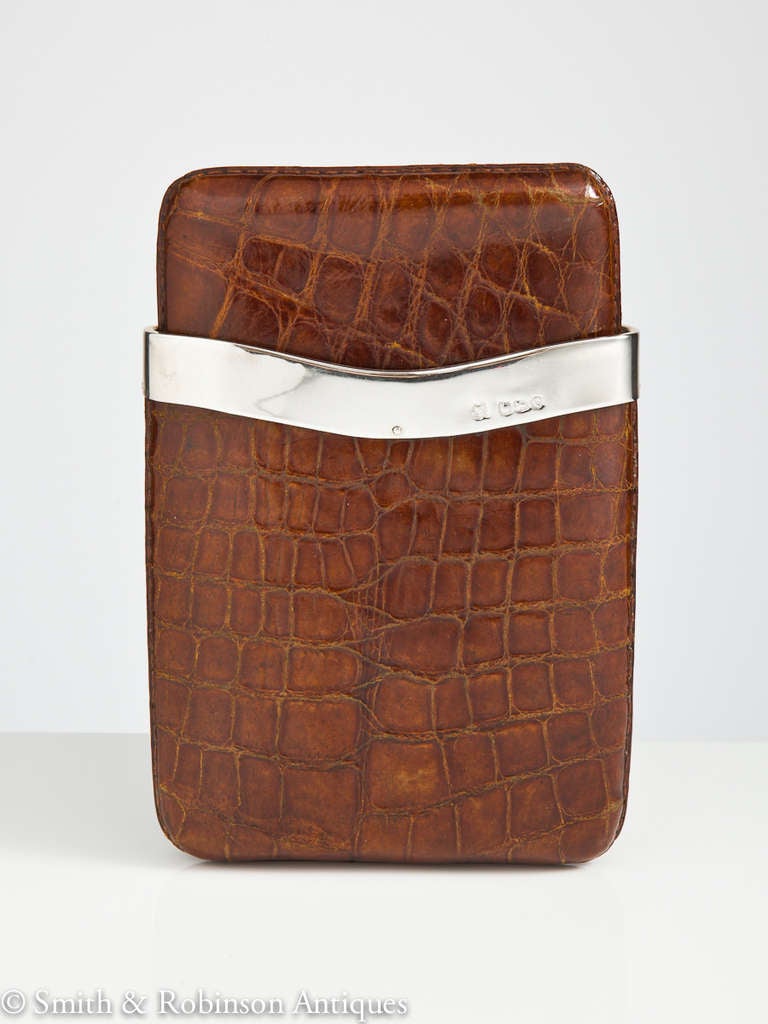 An elegant crocodile & silver cheroot case dated Sheffield 1920.
Natural luggage skin & could be also used for pens/pencils. 

We are always adding to our 1stdibs catalogue so be sure to add us to your favourite dealers & visit our storefront