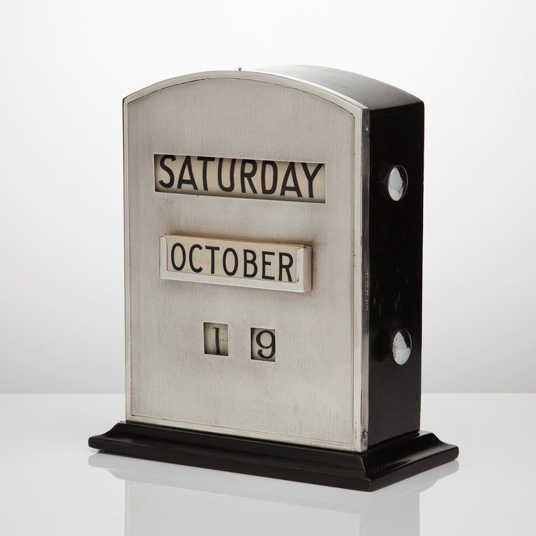 Large silver mounted ebonised desk calendar by makers Samson Mordent & dated Birmingham 1931.