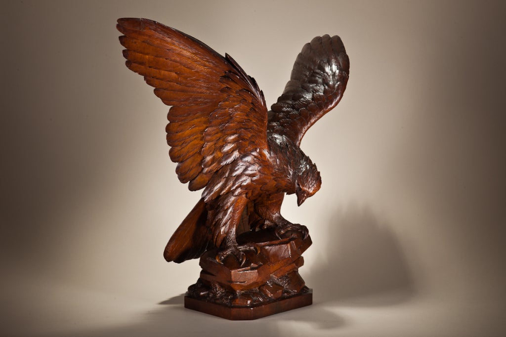 A superb wooden sculpture of an eagle it has overall wonderful detail of wings, body, & talons. 
German circa 1900-10
