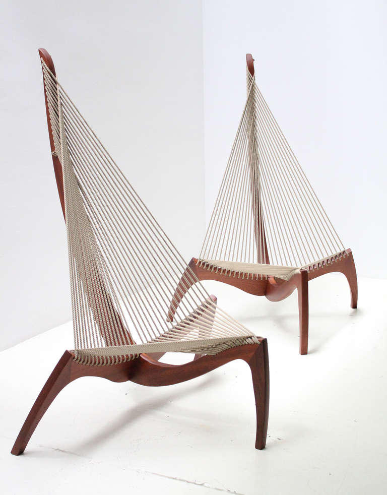 A pair of Harp chairs designed by Jørgen Høvelskov in 1963 and produced by Christensen & Larsen, Denmark. Solid teak wood base and new jute cord.