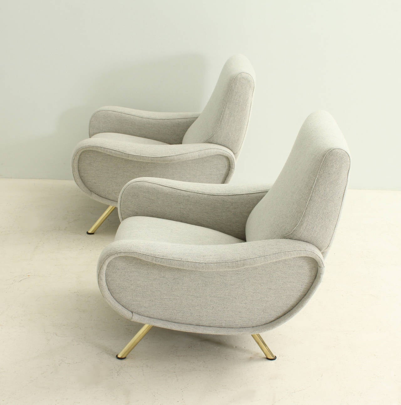 Pair of Lady armchairs designed by Marco Zanuso in 1951 for Arflex, Italy.  Early edition reupholstered with Hallingdal wool fabric.