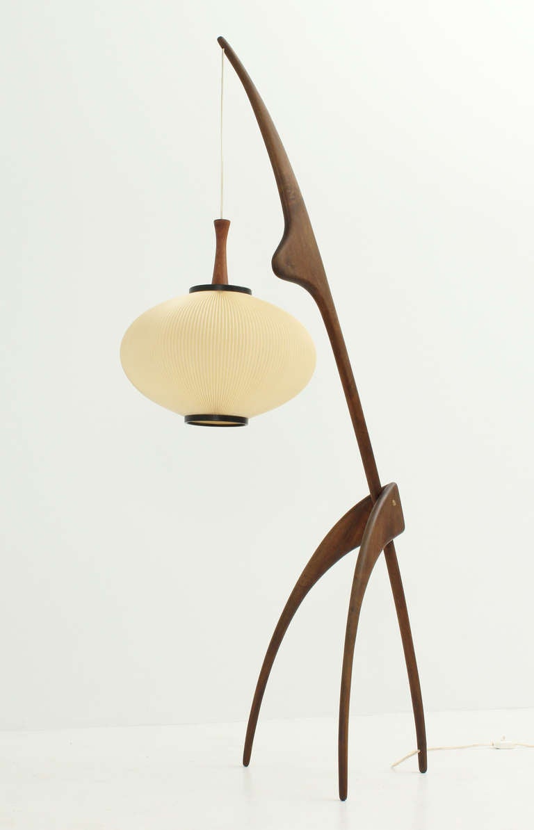 Sculptural floor lamp named Praying Mantis made in 1950's by Rispal, France. Walnut wood structure with inlaid wire and suspended fiberglass bubble shade.