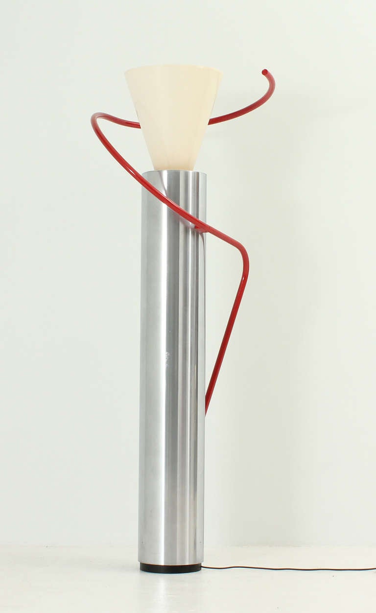 Luminator floor lamp originally designed in 1929 in chrome and wood by Luciano Baldessari for the italian pavillion in the Barcelona Fair of 1929. This is the Luceplan edition from 1979. Chrome and lacquered metal and aluminium.