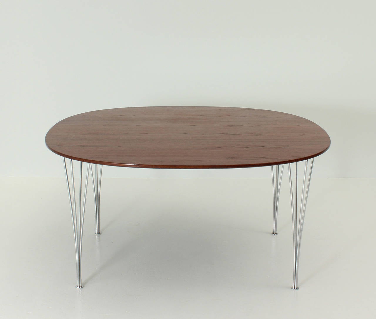 Rare Supercircle table in teak wood designed in 1965 by Bruno Mathsson and Piet Hein for Fritz Hansen, Denmark.