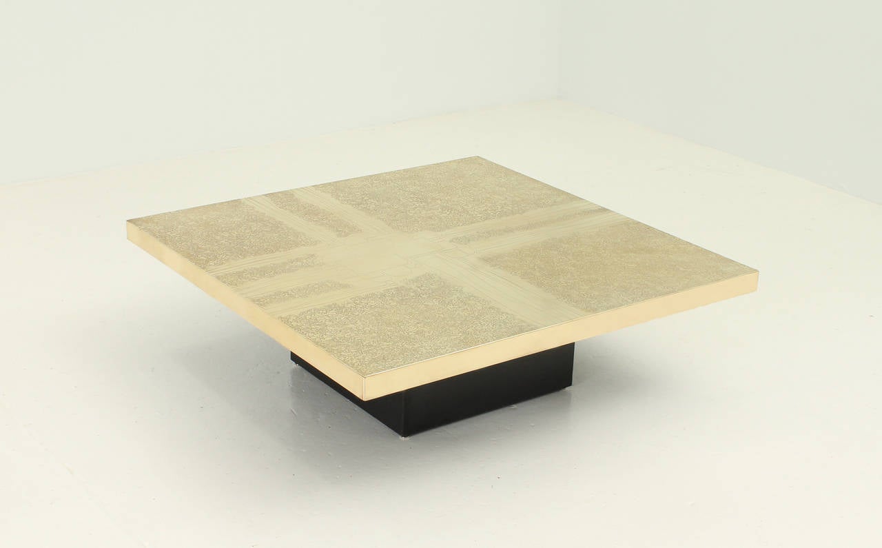 Coffee table designed by George Mathias in 1970's, Belgium. Etched brass top with laminated square base. Signed.