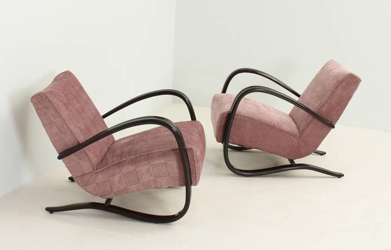 A pair of lounge chairs designed in 1930's by Jindrich Halabala, Czech Republic and produced by Thonet in 1930's-40's. Ebonized walnut bentwood and new fabric. Signed with Thonet logo.
