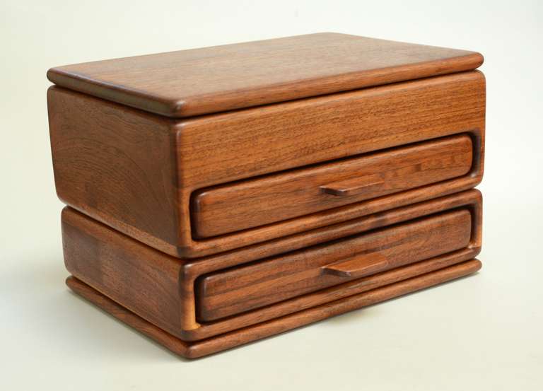 Studio jewelry box with a hinged lid atop two drawers. Each of the three sections has velvet lining and oak dividers.
