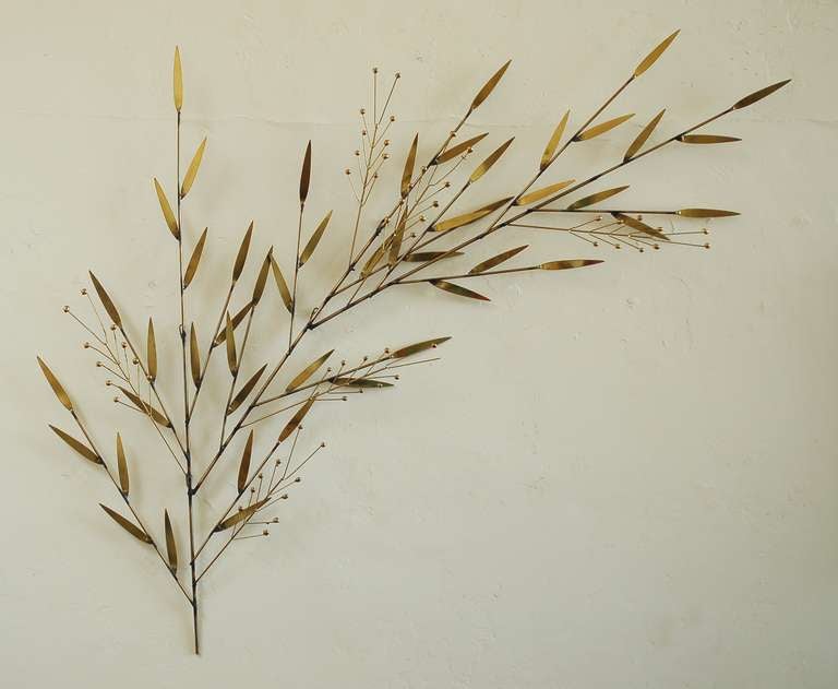 Wall sculpture of branches and leaves by Curtis Jere. This can be hung in any number of positions. The sculpture is signed and dated 1979.