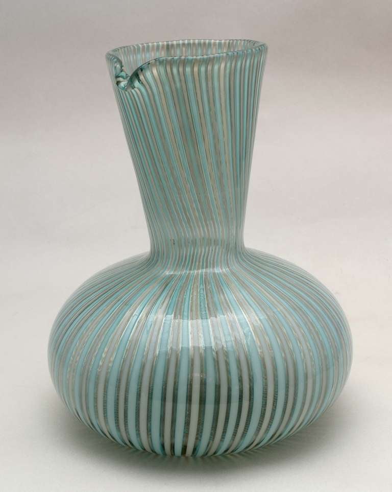 Venini a canne pitcher with pale blue and grey decoration. This form has been attributed to Gio Ponti. This piece in not marked.