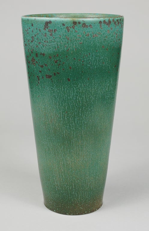 Large porcelain vase by Gunnar Nylund for Rorstrand. This vase has a great green glaze with spots of gunmetal.