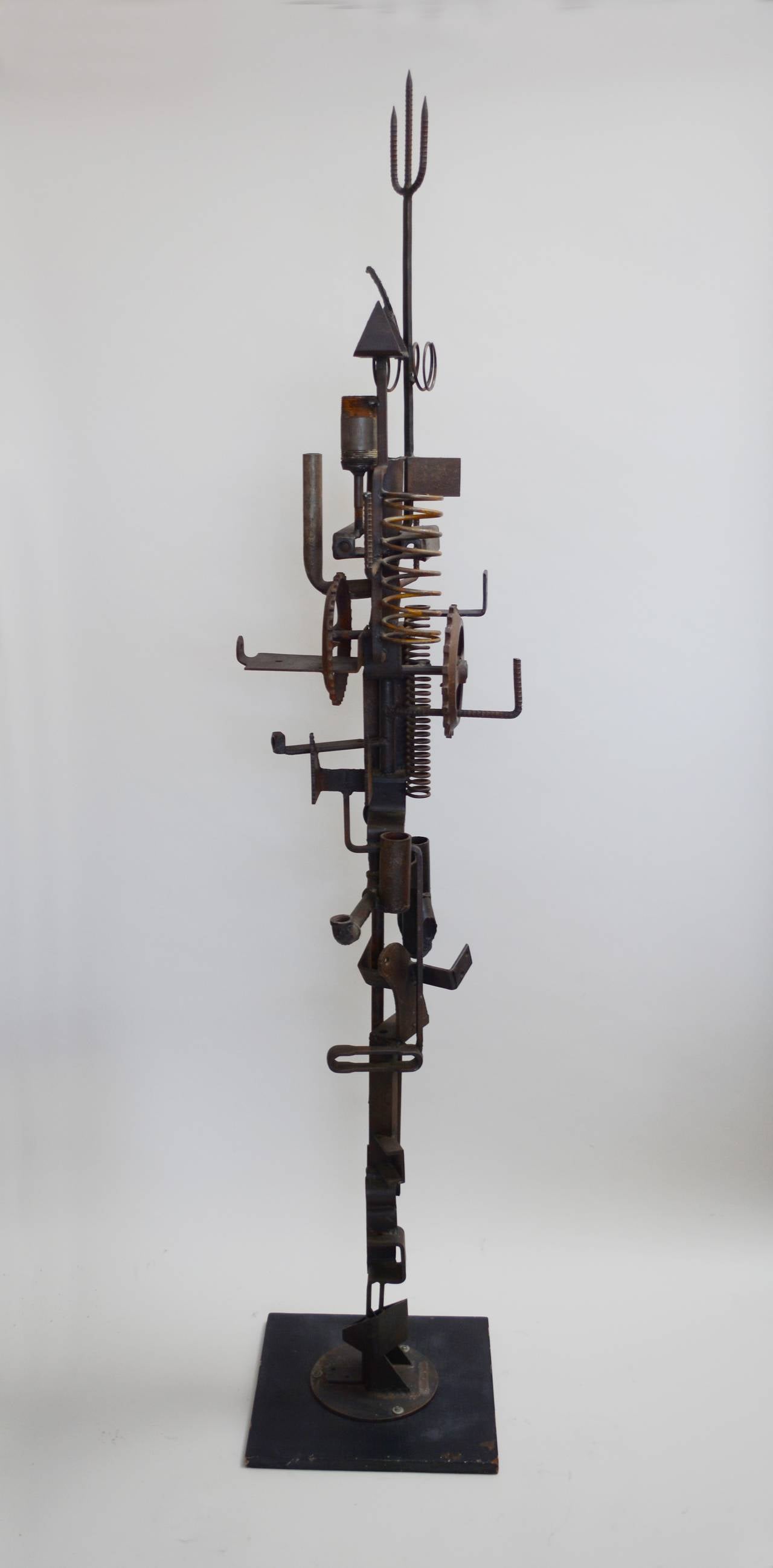 Large-scale assemblage by 20th century artist Shuko Kobayashi (? - 2001). Kobayashi was a painter and sculptor as well as an Ikebana master teacher at the Sogetsu school in San Francisco. He exhibited in Los Angeles and the San Francisco Bay Area.