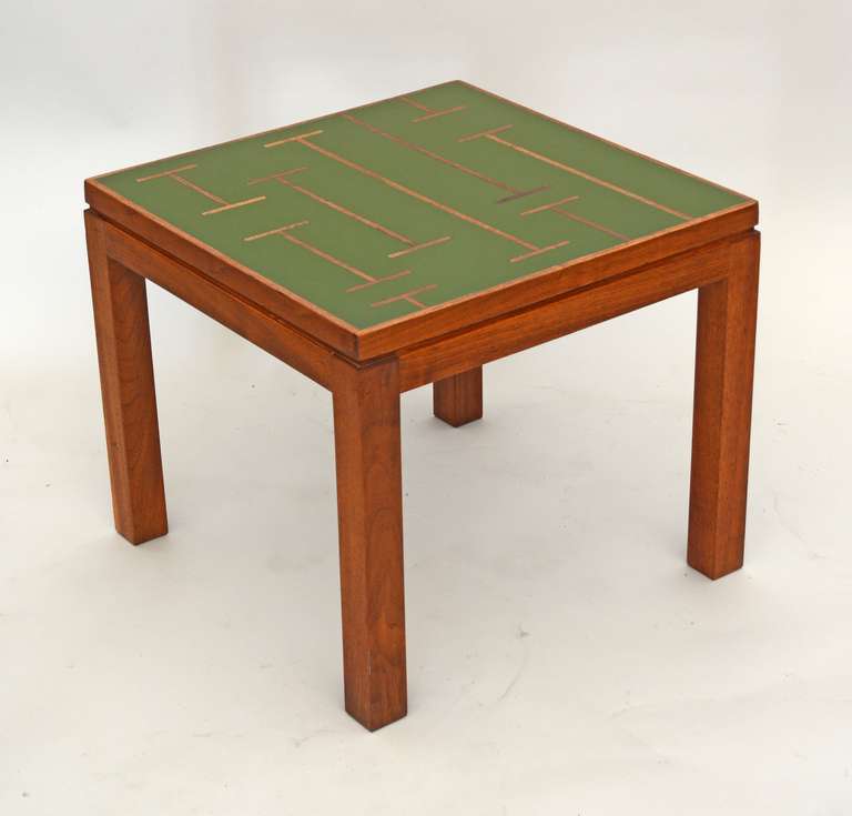 Resin top table by Peter Pepper Products. This table has an uncommon walnut inlay design in the top. The frame and legs are solid walnut.