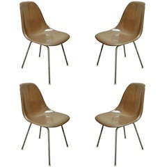 Four Charles and Ray Eames Chairs in Brown