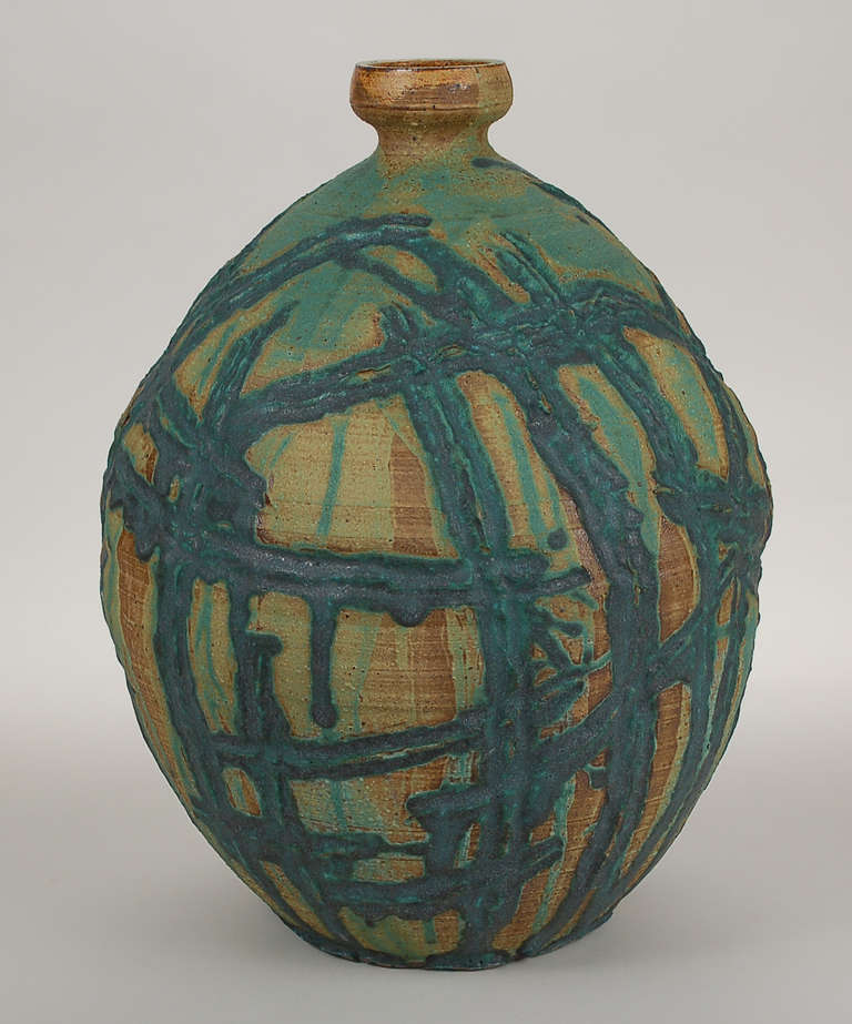 Seldom seen ceramic vessel by Dr. Robert Fritz. Fritz is known more for his work in studio art glass. He was one of the pioneers of the American studio glass movement. He founded the first glass program taught at an University in the early 1960's at