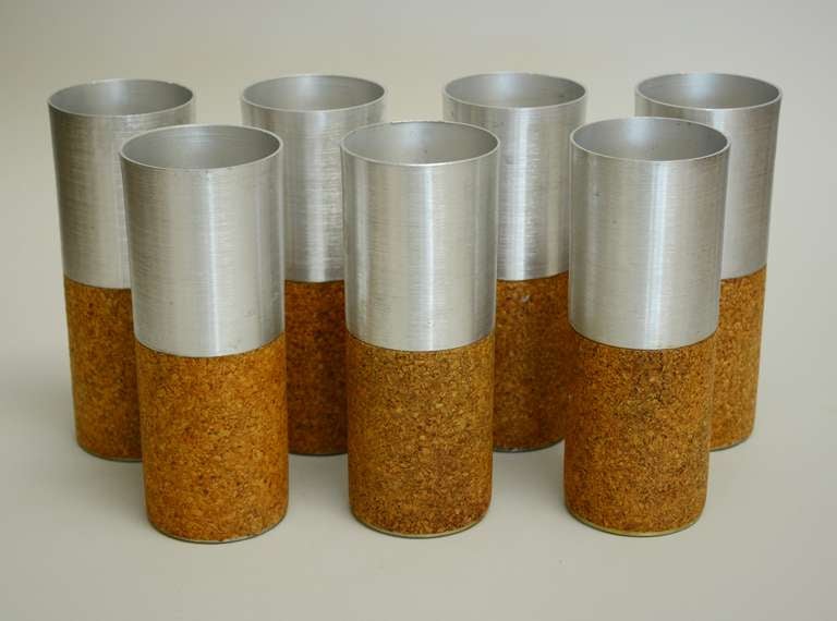 Seven spun aluminum and cork mint julep cups designed by Russel Wright. All are marked Russel Wright on the bottom.