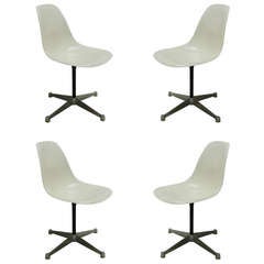 Four Charles and Ray Eames Chairs