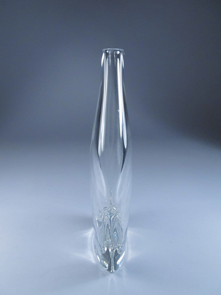Bengt Edenfalk (1924 - ), worked at Skruf glass works as director of design from 1953 to 1978, when he left, and started at Kosta, where he worked from 1978 through 1989.  He has since worked independently at Stromberg.  This piece is signed simply