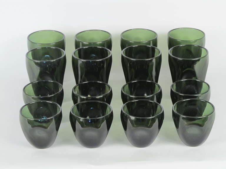 Made by Imperial Glass Company to accompany Russel Wight Iroquois dinnerware pattern.  Set consists of 8 water glasses, and 8 juice or cocktail glasses.