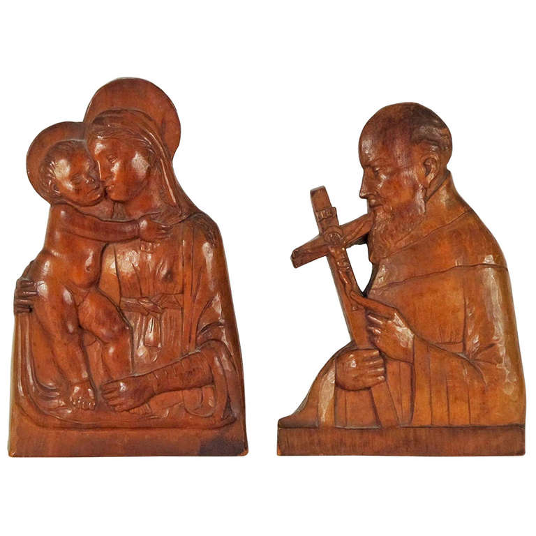 Pair of Bas Relief Carved Wood Religious Figures