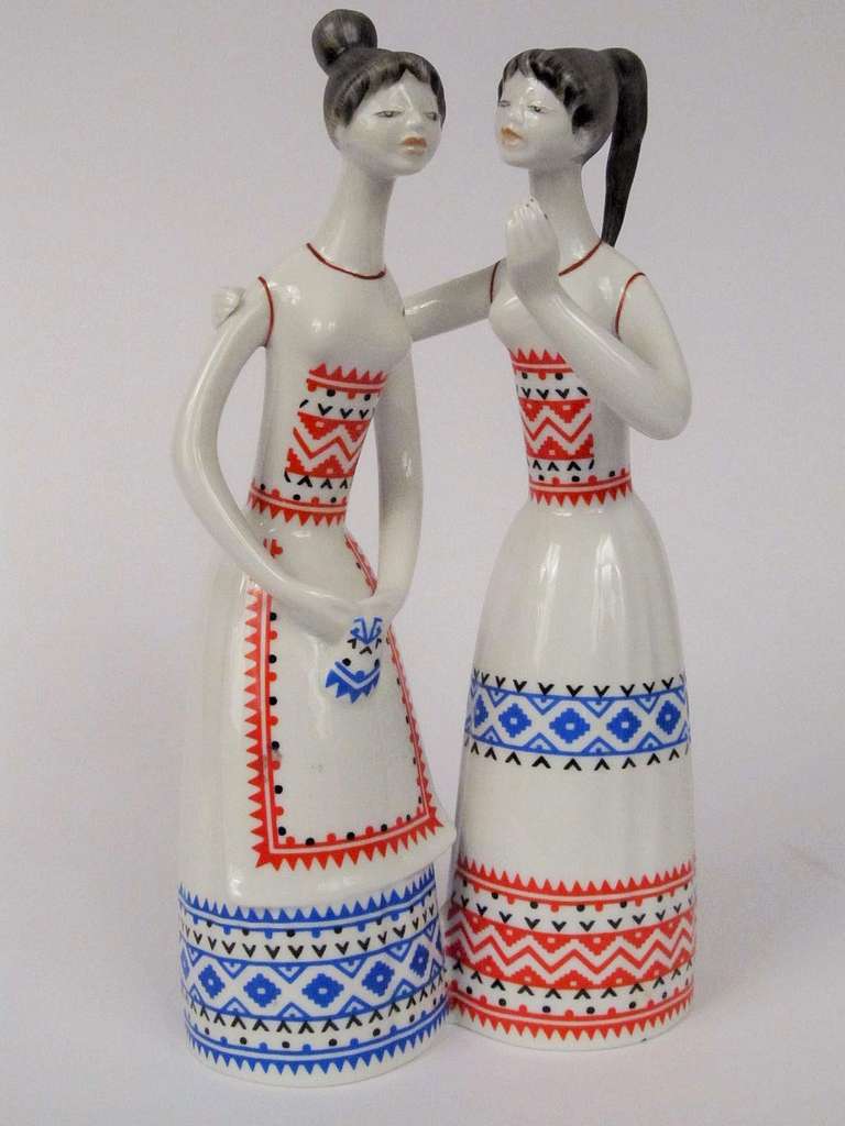 A lovely and unusual ceramic statue executed at Hollohaza in Hungary.  Unlike many ceramic figurines, this one has a wonderful sense of intimacy and friendship.  I especially like the hair styles (very 50's) and the Modigliani inspired elongated