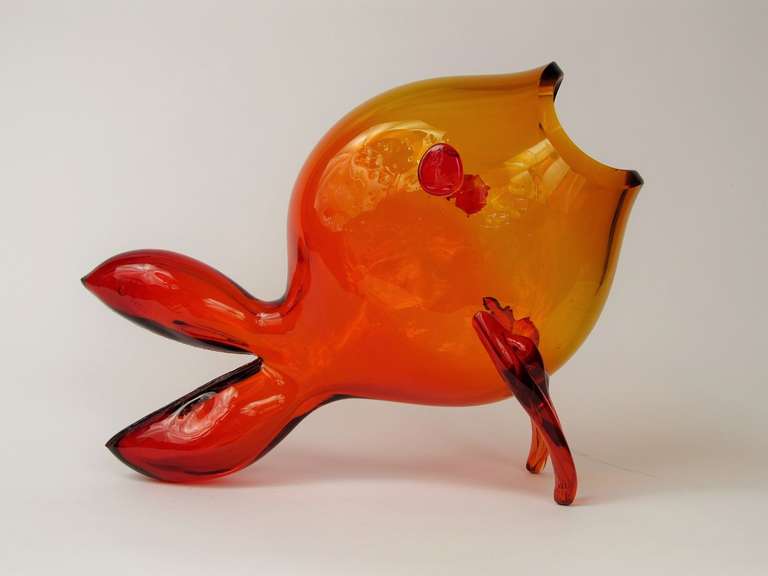 One of Blenkos most distinctive color variations, Amberina, fades from red to amber.  Designed in the early 1950's by Blenkos first major designer, Winslow Anderson.  One of their most playful and whimsical pieces.  Which for Blenko is saying