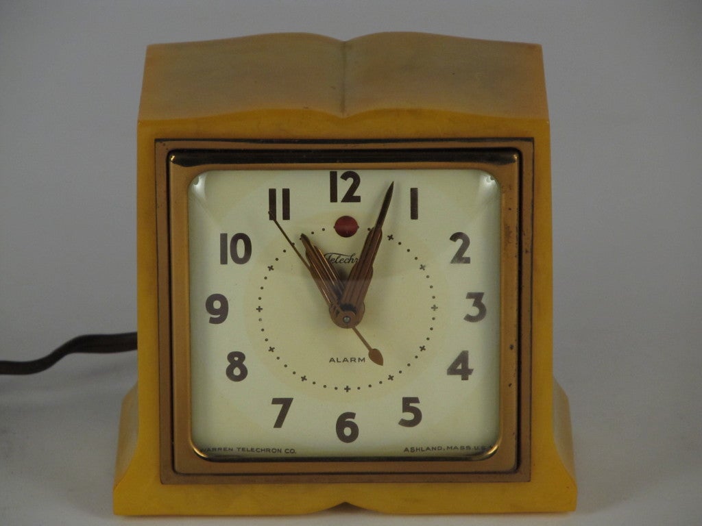 Butterscotch yellow bakelite case, working 1930's Telechron alarm clock.  No cracks or chips.