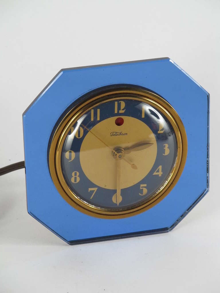 This is the classic American blue glass clock.  It's in very good, near mint condition.  Works perfectly.  