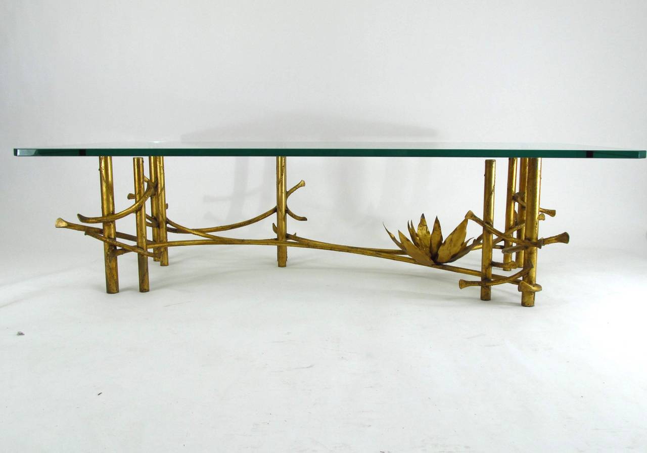 Gilt metal base in a naturalist style, vaguely resembling bamboo, with a giant lotus flower.  Original 3/4
