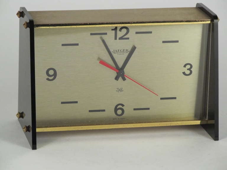 A very stylish clean lined desk clock made by famed 
French clock make Jaeger.  Takes 1 C cell battery.