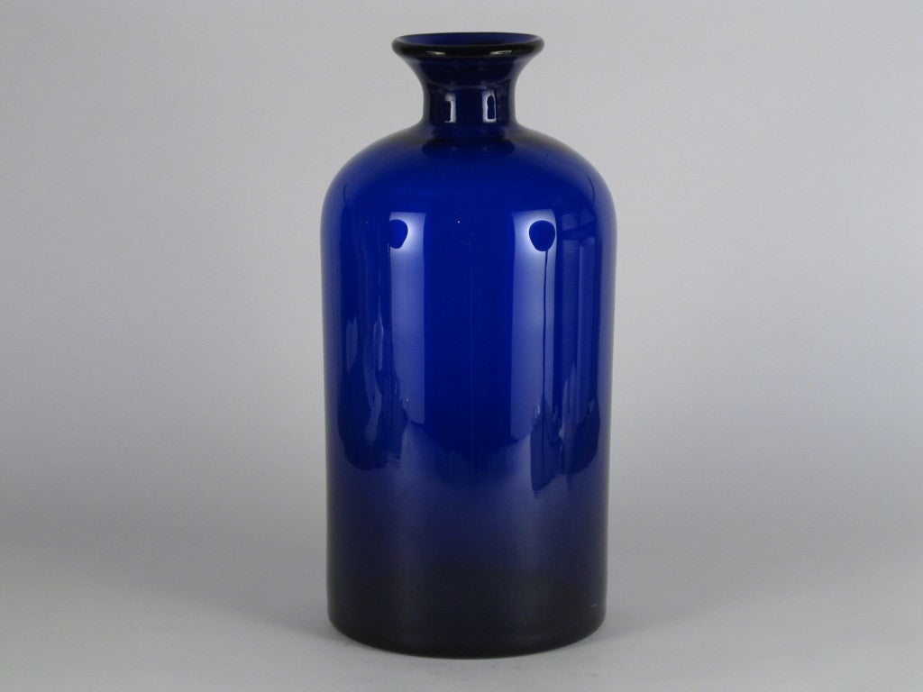 Beautiful cobalt blue bottle with early Kastrup glas label attached.