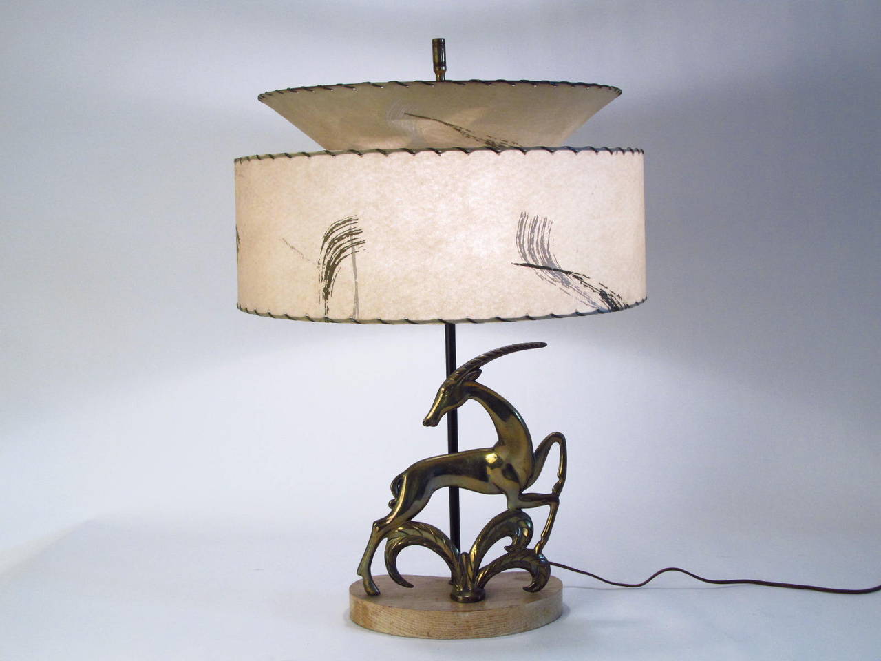 American 1940s Brass Gazelle Table Lamp with Period Parchment Shade