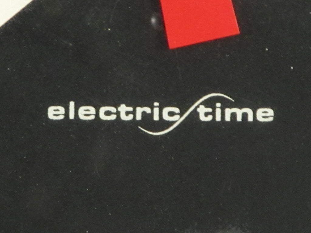 Graphically appealling 24 hour clock from the WW II era.  Operates off of a GE B-3 motor with was used in several of GE's high end Table and mantle clocks of the 1930's