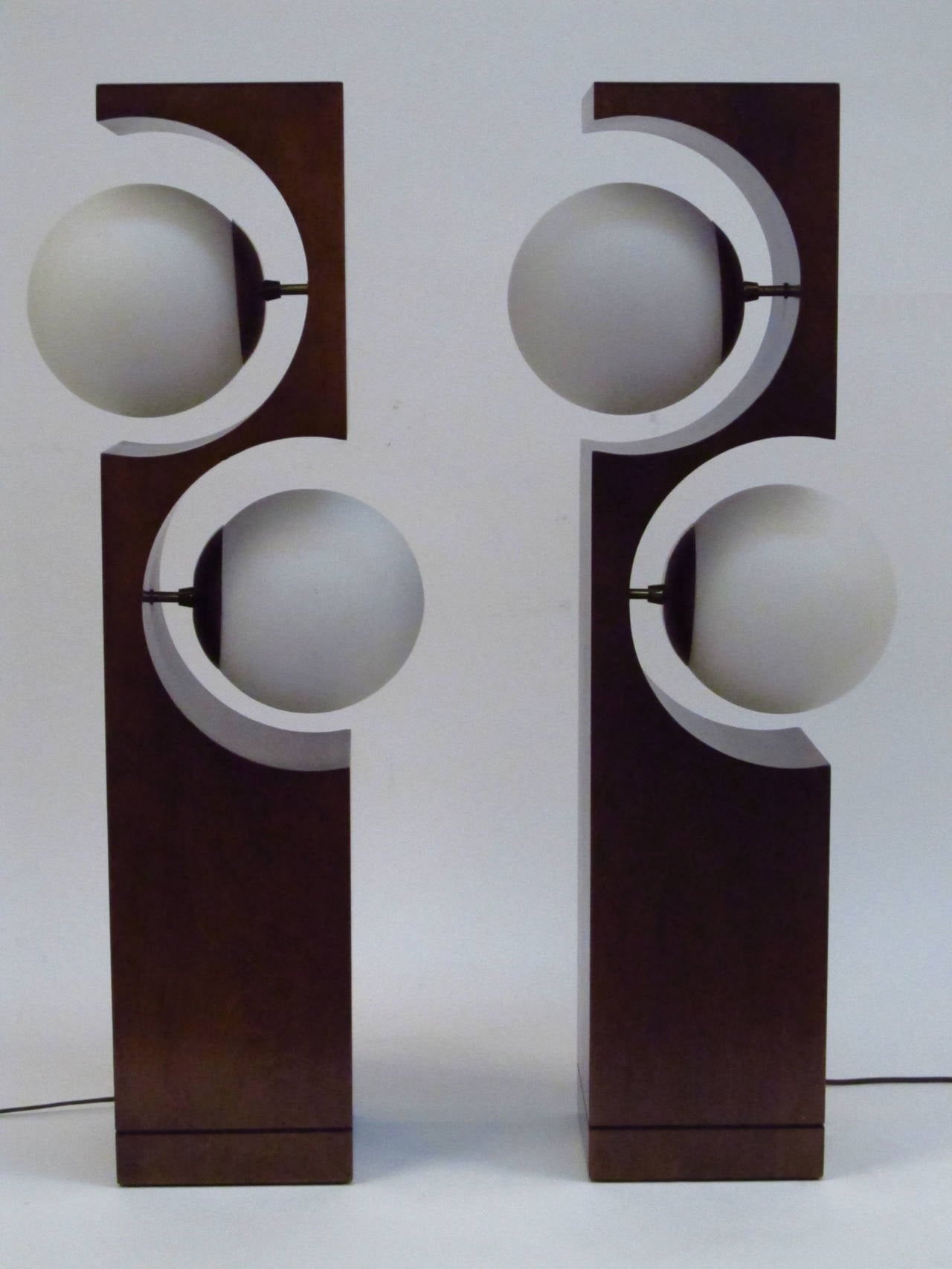 Pair of Modeline double globe table lamps. A very hip look and a pair!