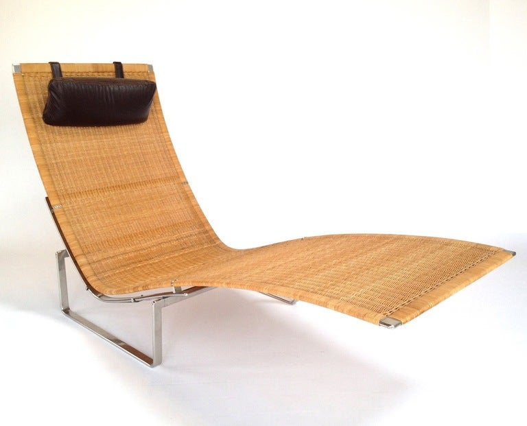 Vintage Poul Kjaerholm PK24 Chaise Longue Lounge Chair.  Very good original condition with some minor wear to wicker.  Headrest Pillow is not original.  From an exceptional Modern Estate.  