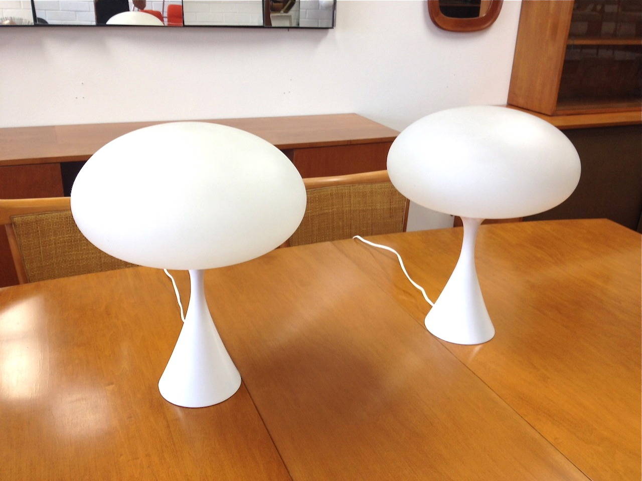 Pair of Laurel Mushroom table lamps. Bases have been professionally restored. Glass shades are original.