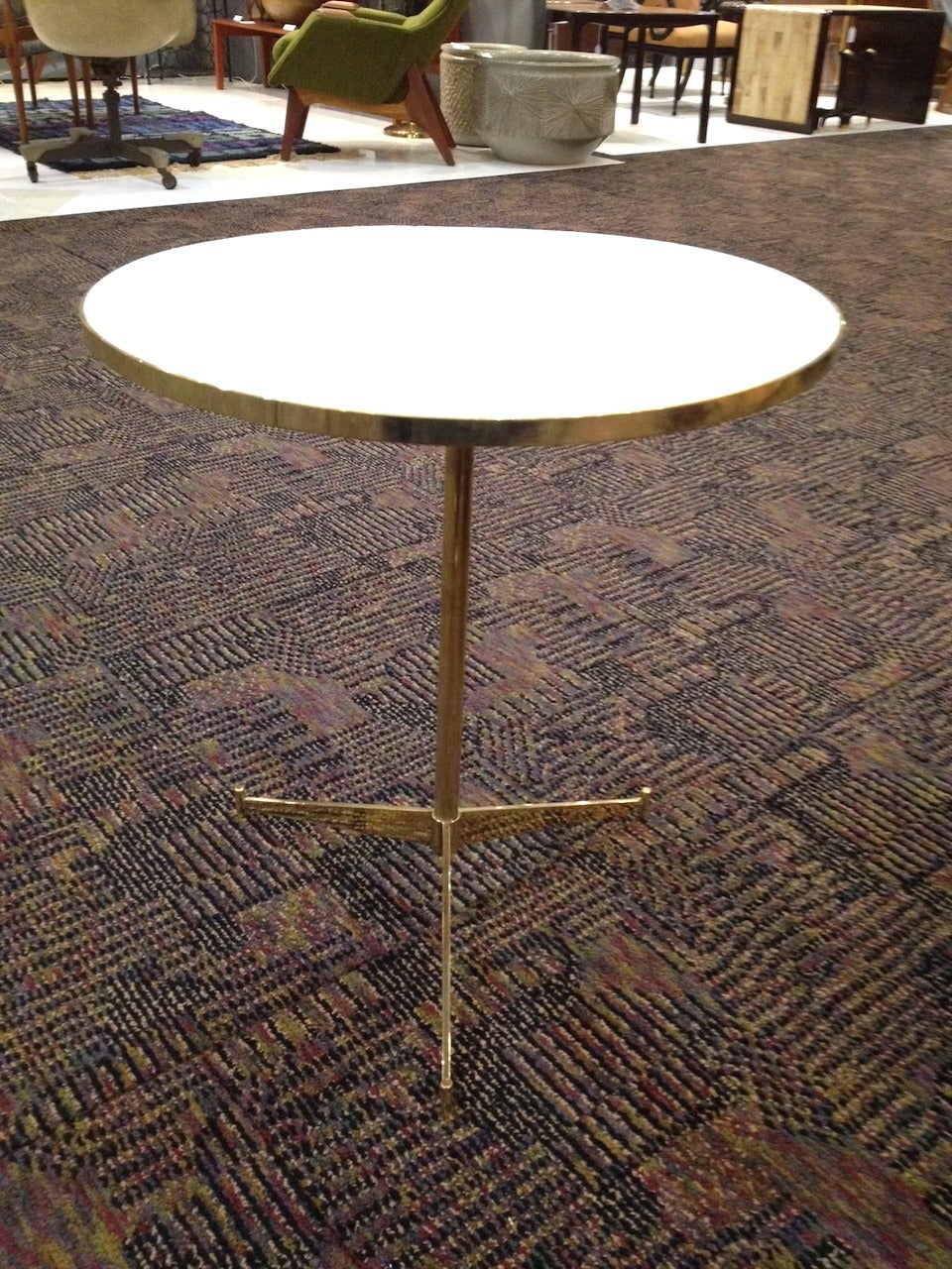 Paul McCobb brass cigarette side table for Directional. Base has been polished, white plexiglass top is not original.