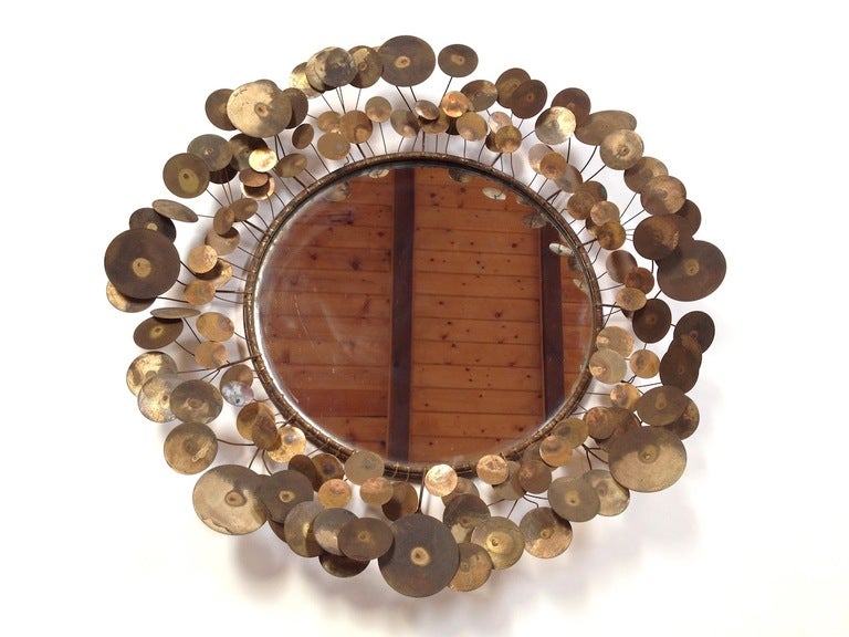 Vintage signed Curtis Jere (C. Jere) Raindrops Wall Mirror.  Good original condition with natural and applied patinas.  Note 2 of the small discs are missing along the rim of the mirror which is not very notable but should be mentioned (see images 8