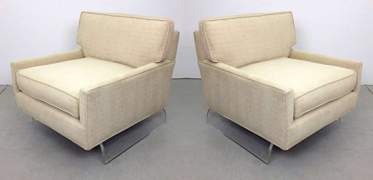 Pair of Lucite Club Lounge Chairs.  Comfortable and great looking low slung lounge chairs on lucite feet.  New upholstery.