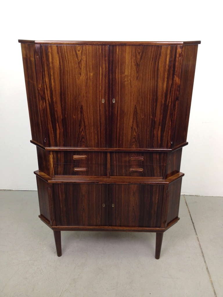 Exceptional Danish Modern rosewood corner cabinet.  Excellent condition.