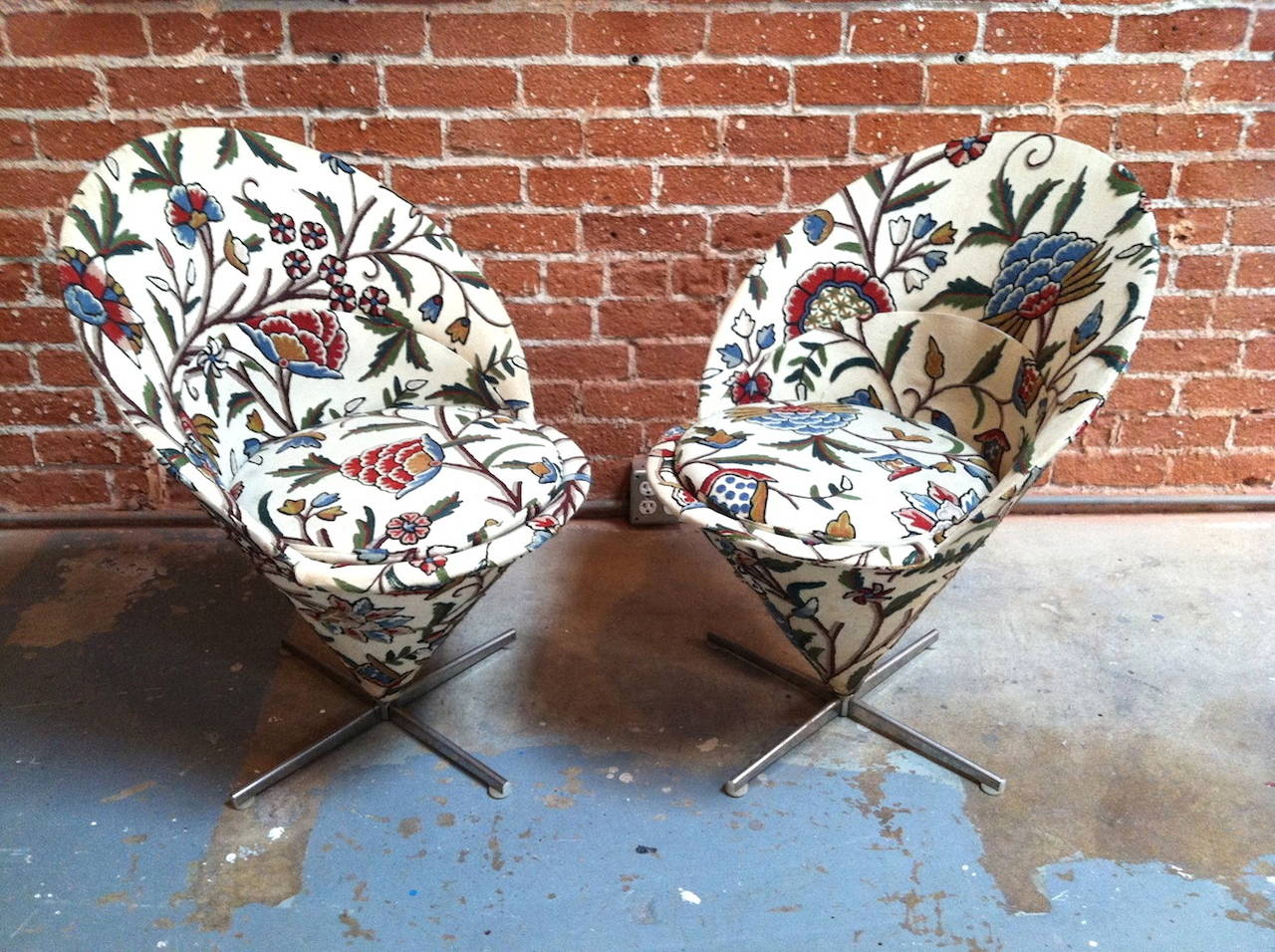 Pair of early Verner Panton cone chairs. Marked made in Denmark inside seats. Sold in as found condition for re-upholstery.