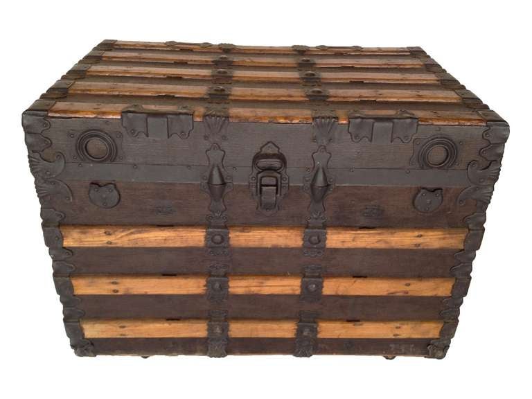 Antique Steamer Trunk c. 1919.  Good condition with a note inside detailing provenance.  Damage to original leather handles as pictured.  Wood has a wonderful patina from age.  Left/Right front latches are missing (see image 2).
